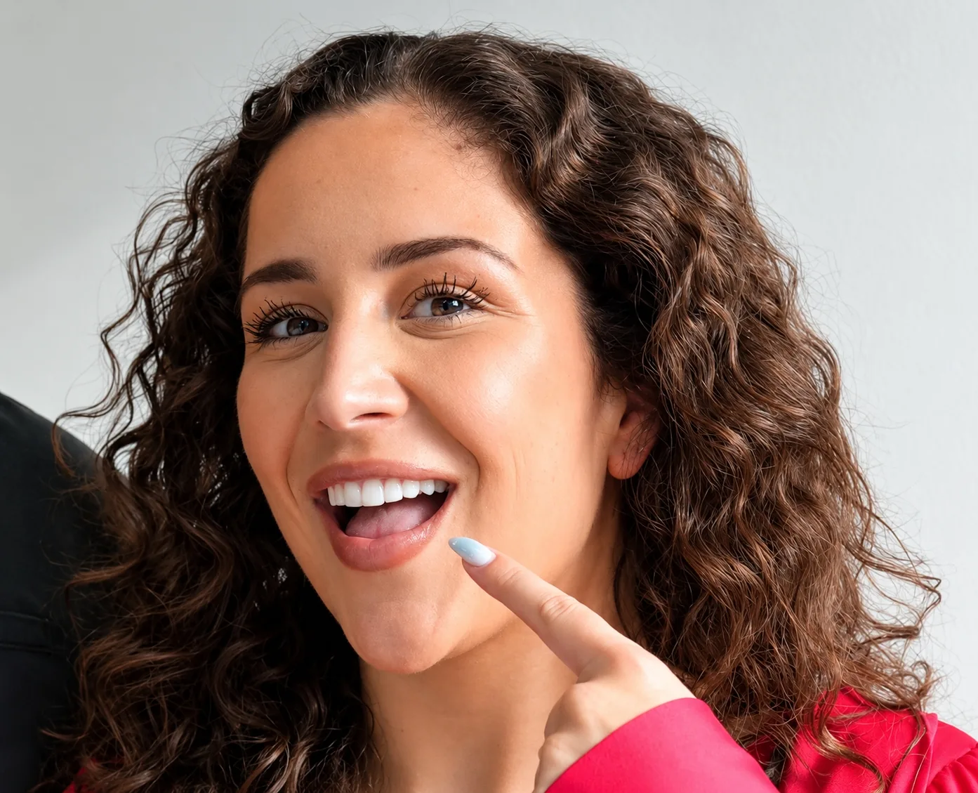 Patient showing the result of treatment for chipped, worn or uneven teeth